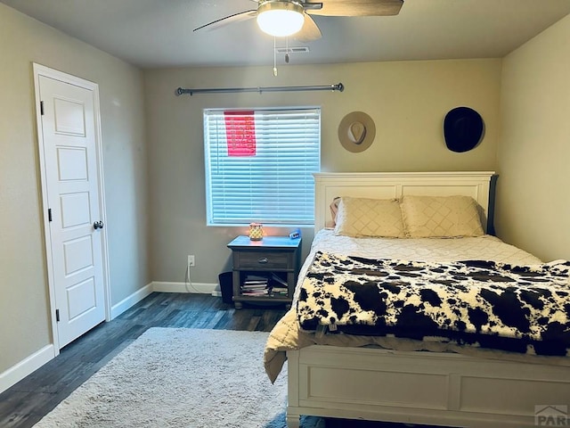 822 S Espanola Dr, Pueblo West, CO 81007 - bedroom featuring baseboards, a ceiling fan, wood finished floors, and visible vents