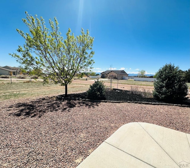 822 S Espanola Dr, Pueblo West, CO 81007 - view of yard featuring a patio