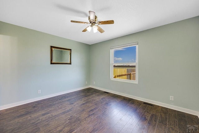 1085 E Blackstone Dr, Pueblo West, CO 81007 - unfurnished room with a ceiling fan and dark wood finished floors