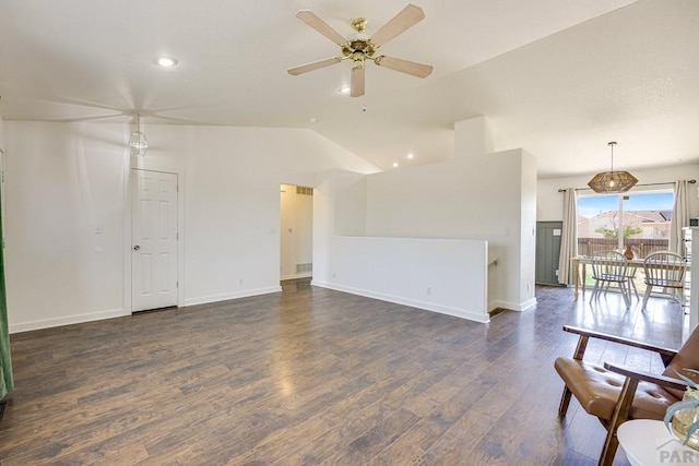 1085 E Blackstone Dr, Pueblo West, CO 81007 - unfurnished living room featuring wood finished floors, a ceiling fan, vaulted ceiling, and recessed lighting