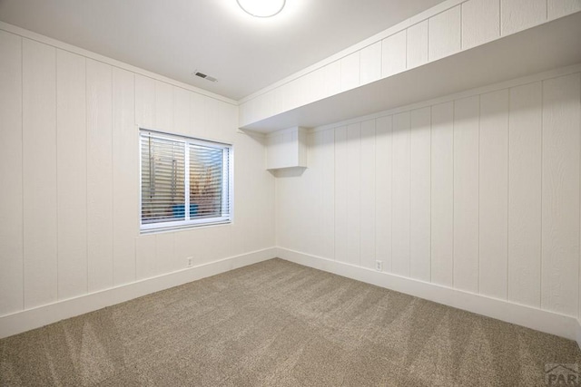 1085 E Blackstone Dr, Pueblo West, CO 81007 - spare room featuring carpet floors and baseboards
