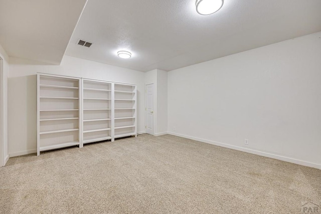 1085 E Blackstone Dr, Pueblo West, CO 81007 - spare room with carpet and a textured ceiling