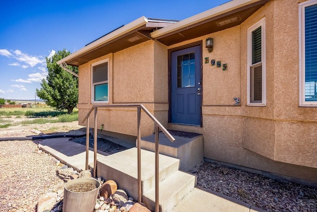 1085 E Blackstone Dr, Pueblo West, CO 81007 - entrance to property featuring stucco siding