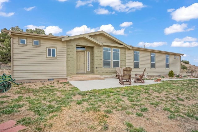rear view of property with a patio area
