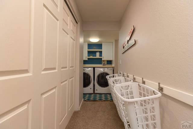 washroom with carpet floors, laundry area, and separate washer and dryer