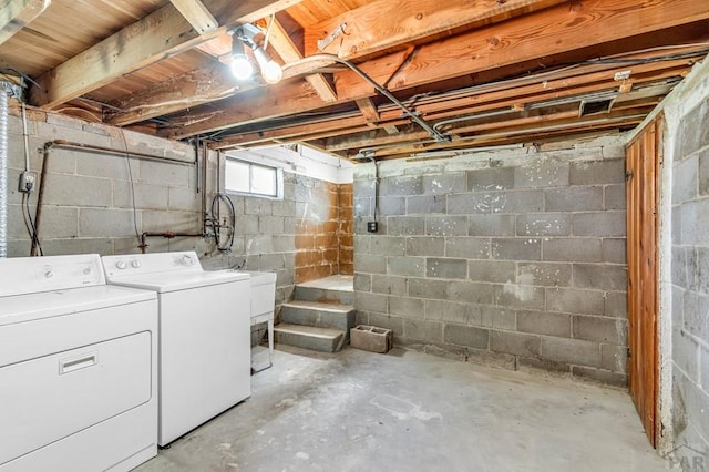 basement featuring separate washer and dryer