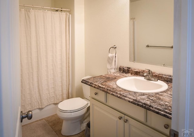 full bathroom with toilet, shower / tub combo, and vanity