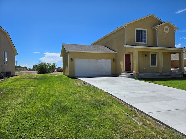 view of front of property with an attached garage, driveway, a front yard, and stucco siding