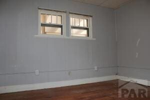 empty room featuring wood finished floors