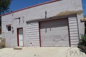 garage with driveway