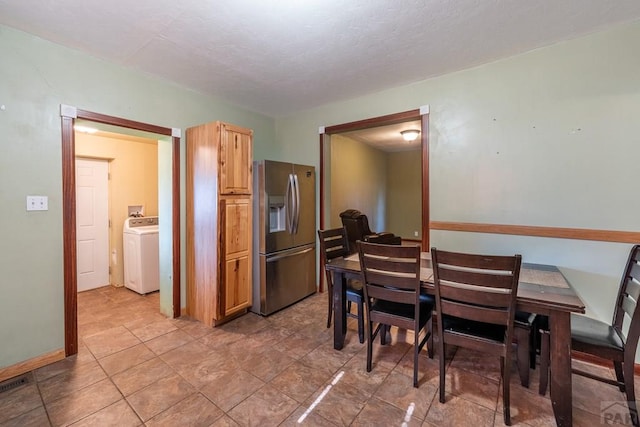 318 E Goddard Ave, Trinidad, CO 81082 - dining room featuring washer / clothes dryer and baseboards