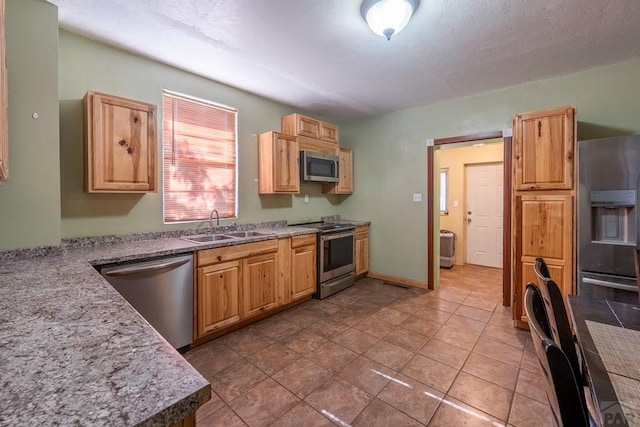 318 E Goddard Ave, Trinidad, CO 81082 - kitchen with appliances with stainless steel finishes and a sink