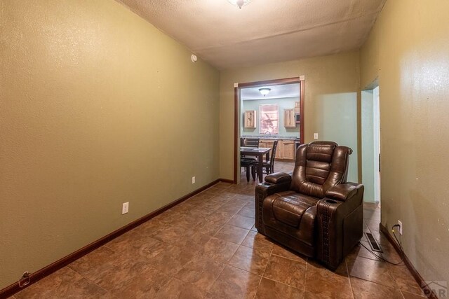 318 E Goddard Ave, Trinidad, CO 81082 - sitting room featuring baseboards