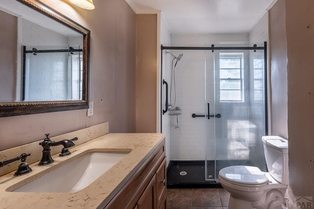 318 E Goddard Ave, Trinidad, CO 81082 - bathroom with toilet, vanity, tile patterned flooring, and a stall shower