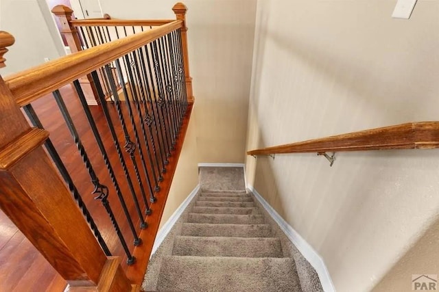 stairway with baseboards