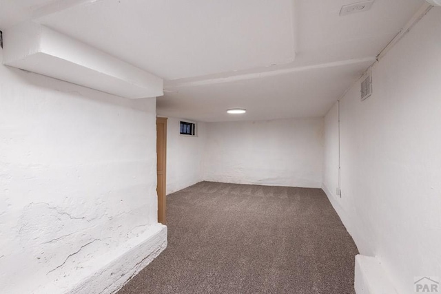 finished basement featuring carpet floors and visible vents