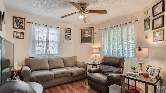 1724 E Abriendo Ave, Pueblo, CO 81004 - living area featuring wood finished floors, a ceiling fan, and a textured ceiling