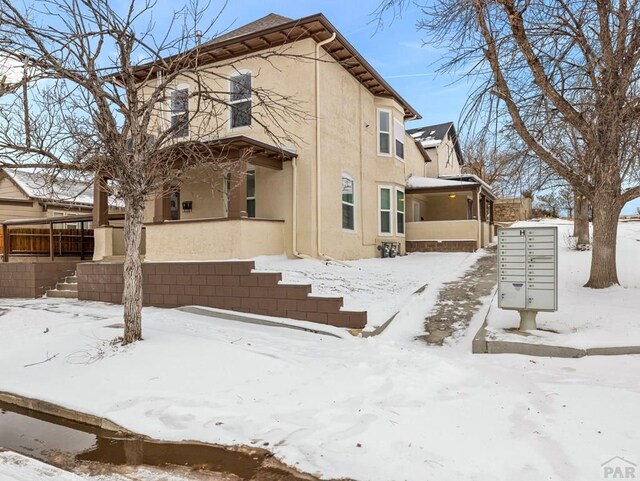 exterior space with stucco siding