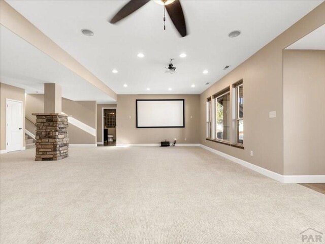 home theater with recessed lighting, light colored carpet, ceiling fan, and baseboards