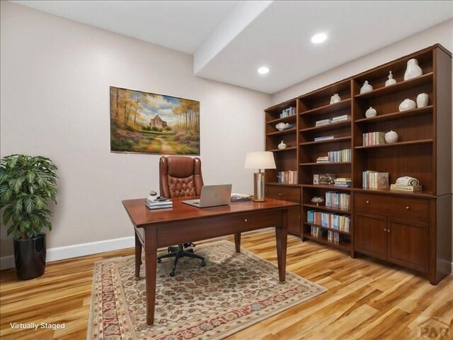 office area featuring recessed lighting, baseboards, and light wood finished floors