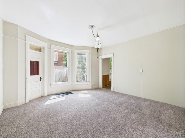 411 Michigan St, Pueblo, CO 81004 - carpeted spare room with baseboards