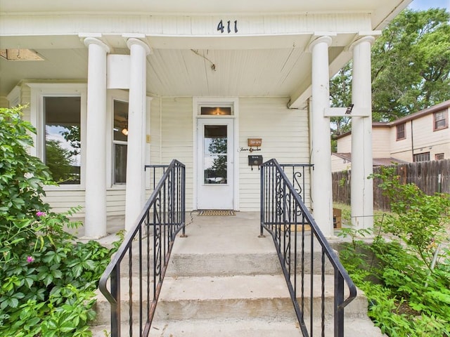 411 Michigan St, Pueblo, CO 81004 - doorway to property featuring a porch