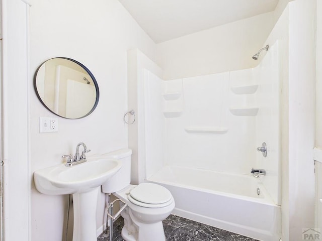 411 Michigan St, Pueblo, CO 81004 - full bath featuring tub / shower combination and marble finish flooring