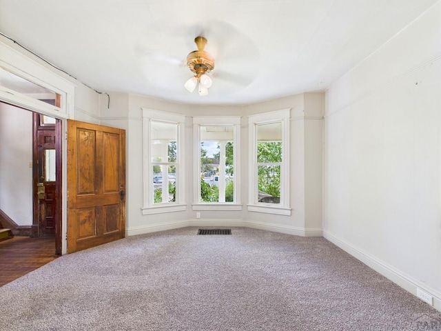 411 Michigan St, Pueblo, CO 81004 - empty room with ceiling fan and carpet flooring