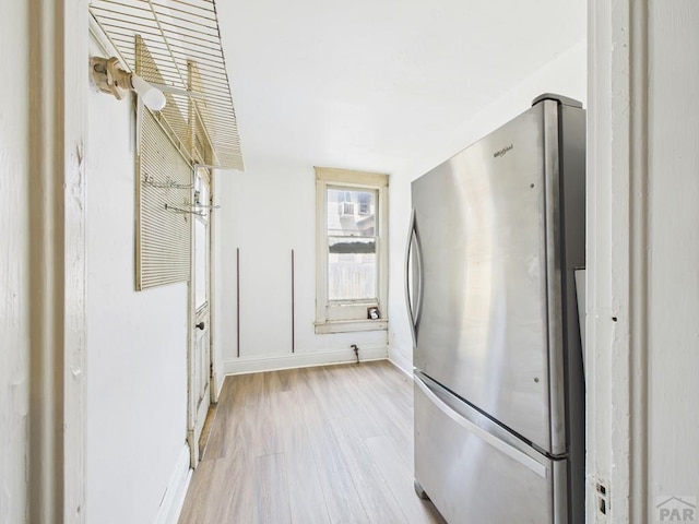 411 Michigan St, Pueblo, CO 81004 - hallway featuring wood finished floors and baseboards