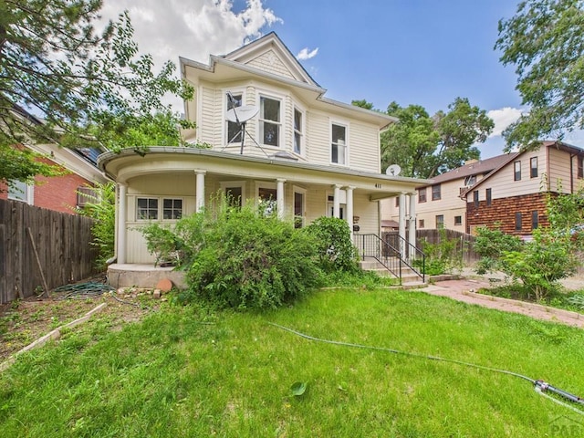 411 Michigan St, Pueblo, CO 81004 - victorian home featuring covered porch