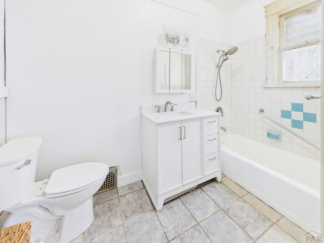 411 Michigan St, Pueblo, CO 81004 - bathroom featuring vanity,  shower combination, and tile patterned flooring