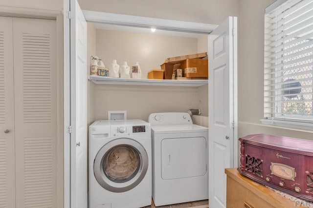 washroom with laundry area and washing machine and dryer