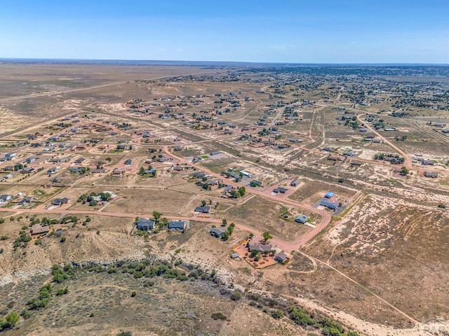 aerial view with a desert view and a rural view