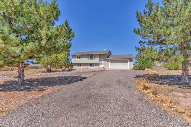 view of front of home featuring driveway and an attached garage