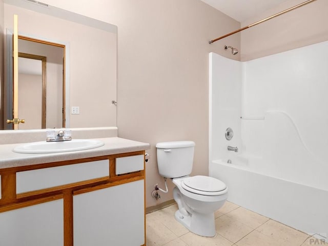 full bath featuring washtub / shower combination, vanity, toilet, and tile patterned floors