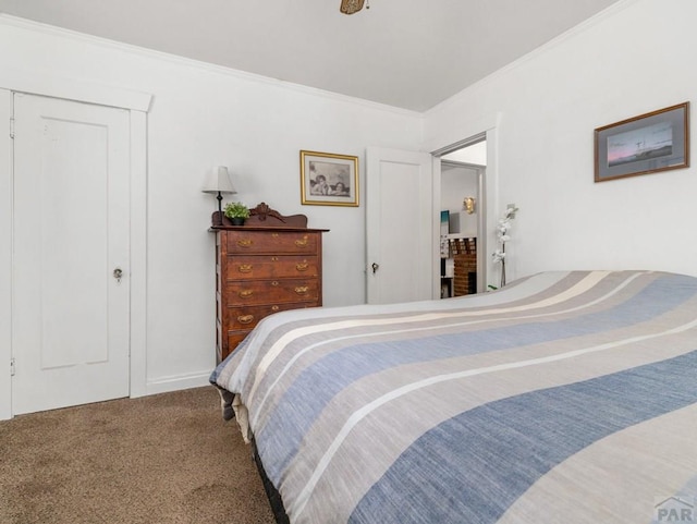 1128 W Summit Ave, Pueblo, CO 81004 - carpeted bedroom featuring crown molding