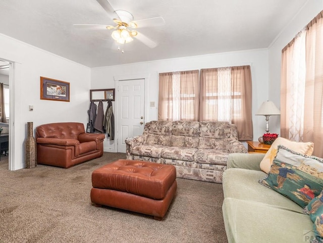 1128 W Summit Ave, Pueblo, CO 81004 - living area with a ceiling fan and carpet