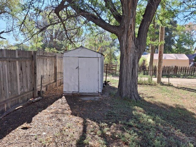 view of shed featuring a fenced backyard