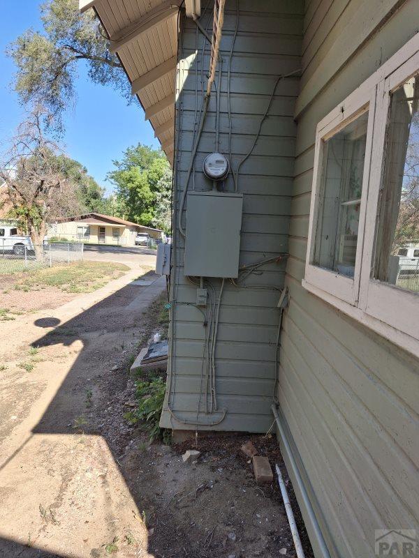 exterior details featuring electric meter