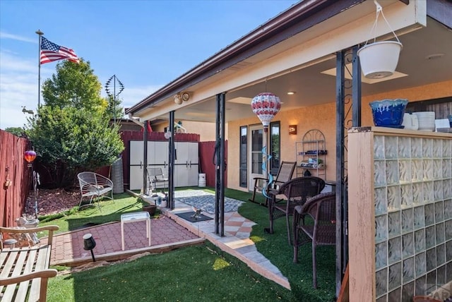 137 W Glenrose Dr, Pueblo West, CO 81007 - view of yard featuring a patio and fence