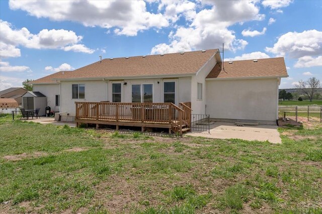49 N Pkwy, Colorado City, CO 81019 - back of property with a patio area, a wooden deck, and stucco siding
