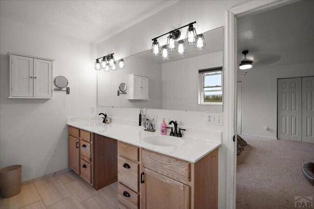 49 N Pkwy, Colorado City, CO 81019 - bathroom featuring double vanity and baseboards