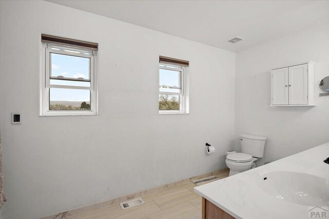 49 N Pkwy, Colorado City, CO 81019 - bathroom featuring toilet and double vanity