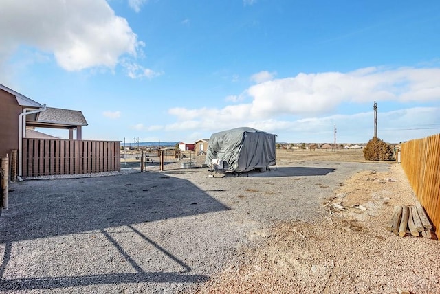 view of yard with a gate and fence