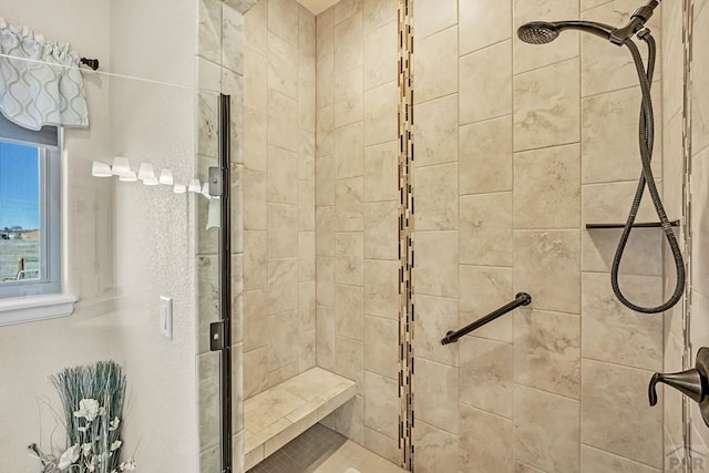 bathroom featuring a shower stall