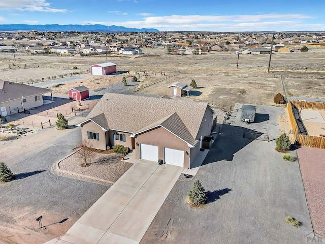 bird's eye view featuring view of desert and a mountain view