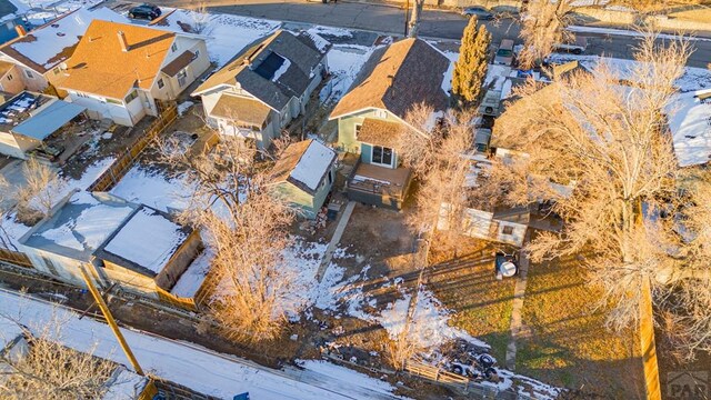 birds eye view of property with a residential view