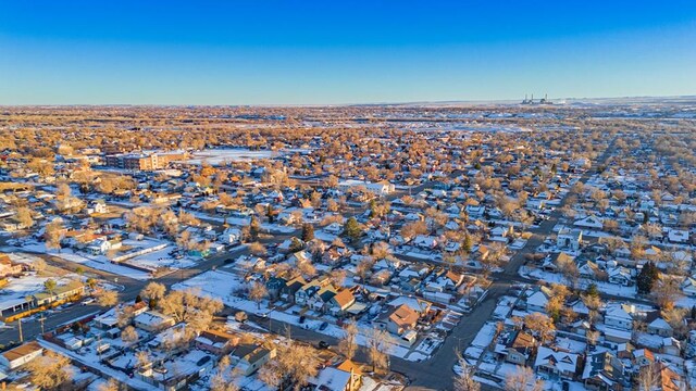 birds eye view of property with a residential view