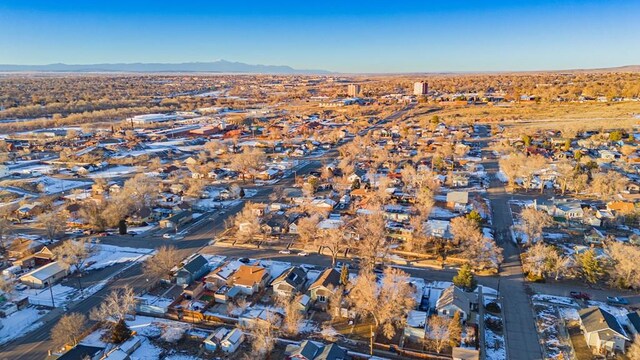 bird's eye view with a residential view and a mountain view