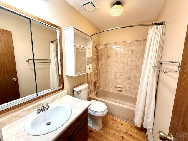 2302 Cartier Dr Unit A, Pueblo, CO 81005 - bathroom with wood finished floors, vanity, and shower / bath combination with curtain